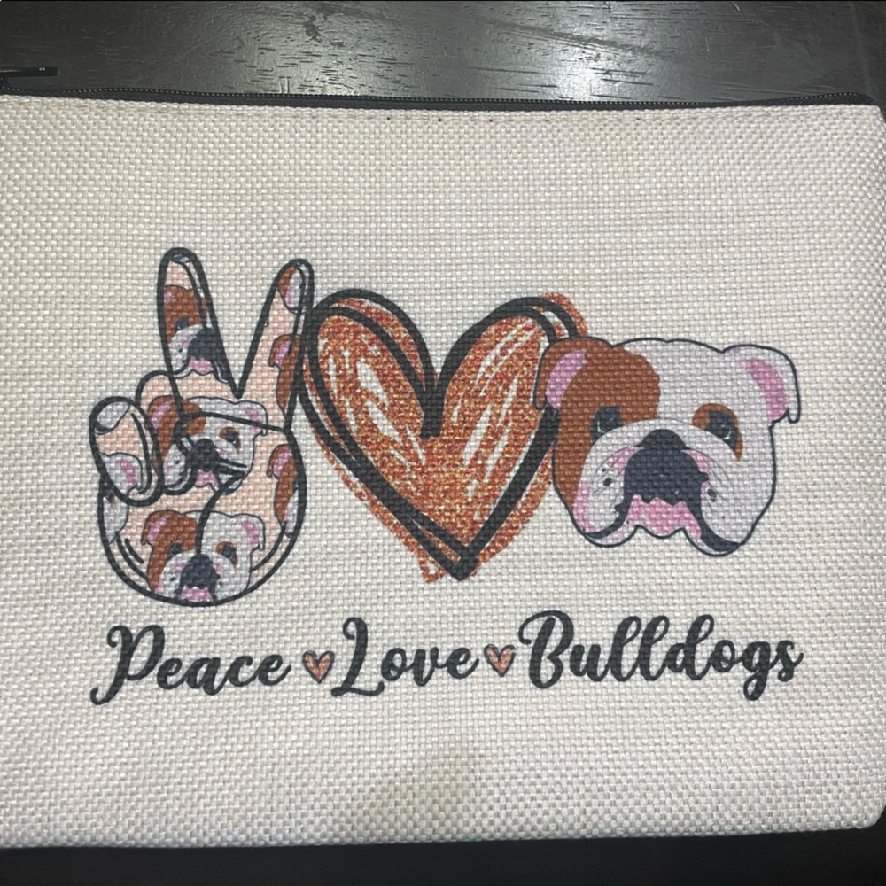 Brand new, never used “peace, love, bulldogs” zipper bag
